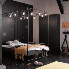 It's made from stainless steel in a matte black finish and features it's indulgent, luxurious and you deserve it: Black Metal Small Double Four Poster Bed Woood Cuckooland