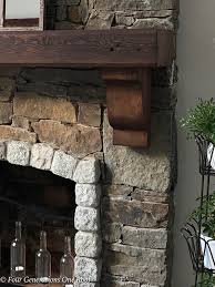 hang a wood mantel on a stone fireplace