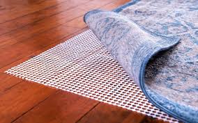 how to keep rugs from sliding on carpet