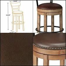 Make sure your bar stools' seats are about 10 to 12 inches below the underside of the kitchen counter so your legs don't feel squeezed. Modern Bar Stools Pinnadel Swivel Bar Stool Ashley Furniture Signature Design Pub Height Home Garden Entsrilanka Org