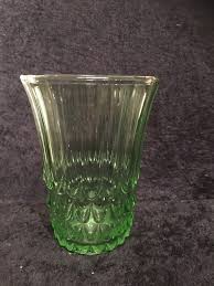 vintage green uranium glass fluted vase