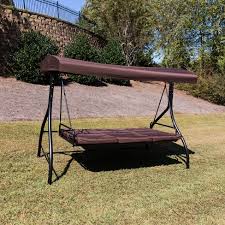 It comes with a includes: Flash Furniture 3 Seat Outdoor Steel Converting Patio Swing Canopy Hammock With Cushions Outdoor Swing Bed Brown Target