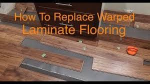 water damaged laminate floor boards