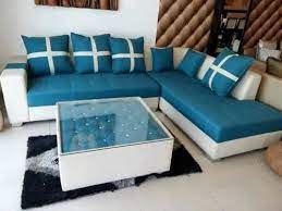 Blue L Shape Sofa With A Tea Table For