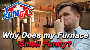 why does my furnace smell funny you