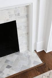 A White Marble Tile Fireplace Update