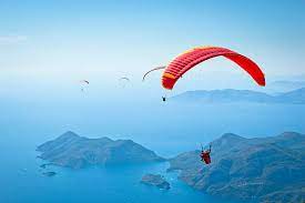 Paragliding Orange Stock Photos Pictures Amp Royalty Free Images Istock gambar png
