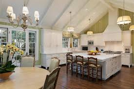 My huband and i can not i like the fixtures, as long as the lights aren't on, but i cannot stand the light they cast! Traditional White Kitchen With Vaulted Ceilings Hgtv