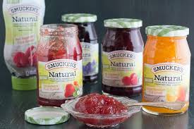 main image of smucker s natural fruit spreads in squeeze bottle jars and in a gl