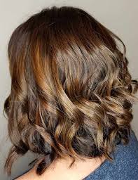 A layered bob haircut is a type of short haircut that can be achieved when you get your hair cut in varying lengths, creating the illusion of more texture and dimension in your hair. 50 Chic Curly Bob Hairstyles With Images And Styling Tips