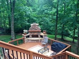 Stone Outdoor Fireplace In Waxhaw With