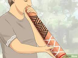 Whistle with a blade of grass ; 4 Ways To Play The Didgeridoo Wikihow