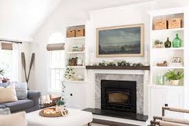 A Brick Fireplace With Wood Stone