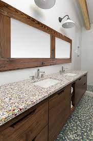 A strip of stainless steel beneath the faucets provides protection against splashes. Backsplash Or No Backsplash Glasseco