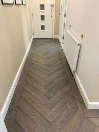 Freshen up your living room by going for painted wood. Small Hallway Flooor Wood Floor Design Herringbone Wood Floor Entryway Flooring