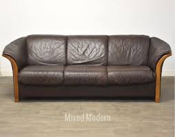Ekornes Brown Leather And Teak Sofa