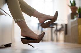 her brown high heeled shoes