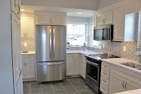 Can you call a decorative wall that's not behind a sink a backsplash? A Kitchen With Country Charm Harvests Style And Comfort Farmhouse Kitchen Other By Village Home Stores