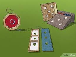 Each board, depending on the game type, has 1 or 3 holes in which players can throw washers. How To Build A Washer Game With Pictures Wikihow