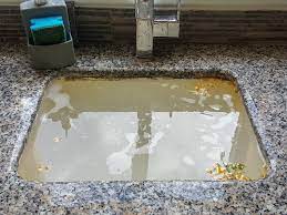 kitchen sink clogged on both sides