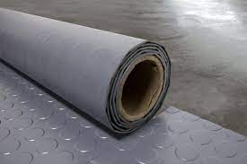 install garage floor mats or tiles