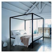 A stunning wood canopy bed is the perfect furniture. Milleunanotte Four Poster Bed Wenge Stained Oak Pelle Scozia Leather Super King By Zanotta At The Conran Shop