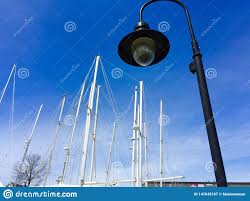 Light Pole With Sail Boat Masts In Background Stock Image Image Of White Ocean 147645167