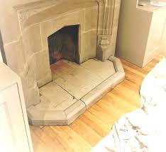 old grubby stone fireplace transformed