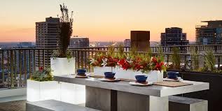 A small sofa, a wood slice coffee table, a few. 20 Luxury Rooftops And Patios Best Patio Roof Ideas
