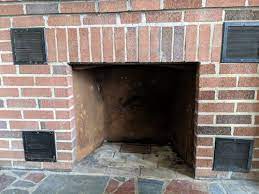 Old Brick Fireplace With Heatilator Vents