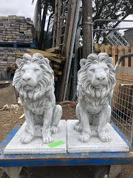 Pair Of Concrete Lion Ornaments A And