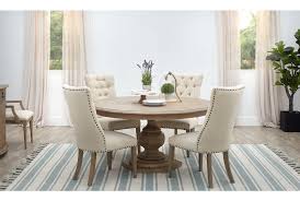 A bit tricky to assemble as the directions were not clear. Haddie Light Tone Round Table 4 Upholstered Chairs Dining Room Dining Sets City Furniture