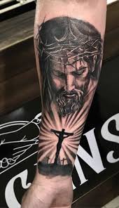 Get your christian tattoo ideas here! Cross Arm Jesus Tattoo Tattoo Design