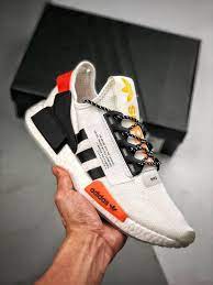 After its initial release, this model blew up on the resale market, selling for upwards of. Adidas Nmd R1 V2 White Solar Red Black Fx9451 For Sale Sneaker Hello