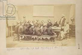 Image of Group of Parsee pupils and masters in class of the by English  Photographer, (19th century)