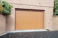 Porte de garage sectionnelle sur-mesure - Alu, bois, PVC, acier ...