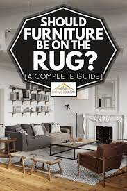 should furniture be on the rug a
