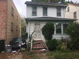 dilapidated bank owned homes in queens