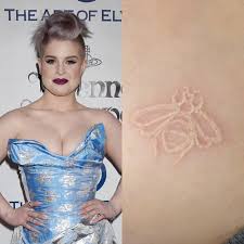 Check spelling or type a new query. 12 Celebrity Bee Tattoos Steal Her Style