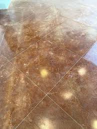 neglected stained concrete floor