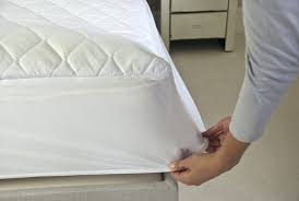 a mattress cover and pad