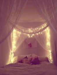 17 Twinkly Ways To Light Up Your Home With Christmas Fairy Lights Headboard Curtains Dream Bedroom Romantic Bedroom