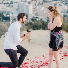 When you're wondering how to propose to a man, you first must make sure you have the greatest probability of success. This Guy Proposed With 16 Dogs So All Other Boyfriends Can Just Go Home