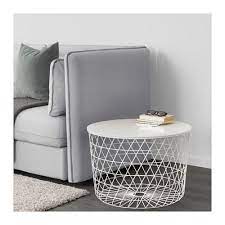 Remote controls, magazines, popcorn bowls… your living room table has a lot to take care of. Kvistbro Storage Table White 24 Ikea Table Storage Ikea Coffee Table Round Coffee Table Ikea