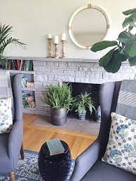 Painted Stone Fireplace Makeover The
