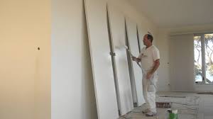 Roll out the excess moisture on a piece of scrap lumber or kraft paper or even on a paper grocery bag. How To Paint Tall Flush Flat Panel Doors With Oil Based Paint Enamel Using A Roller Youtube