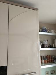 damaged gloss foil kitchen cabinet door