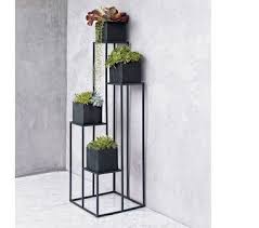 This is a classical design planter stand and a perfect choice this is a simple yet modern design plant stand to consider buying today. Indoor Tiered Plant Stand Ideas On Foter Modern Plant Stand Flower Stands Metal Plant Stand
