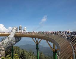 The golden bridge on the ba na hills, da nang, vietnam has opened, and this stunning footage shows what its like to walk over.the pedestrian walkway. Guide To Visit Vietnam Golden Bridge Hand Giant Bridge Tours