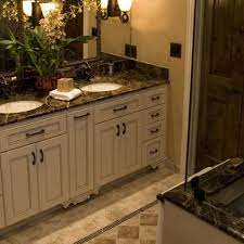 Granite vanity tops or silestone quartz vanity tops are available in the colors shown below. This Gorgeous Bathroom Uses Emperador Dark Marble Countertop Discontinued Shower Surround But Beautiful Bathroom Cabinets Brown Countertop Dark Bathrooms